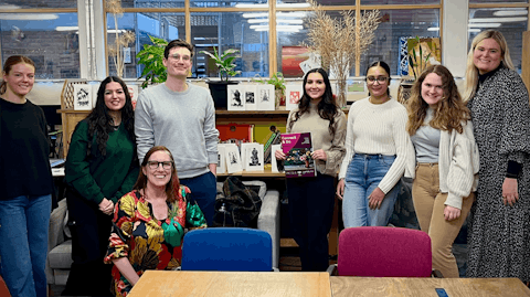 Image shows people from Kilburn and Strode smiling at the camera at the Connect and Do community workshops